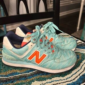 Wore a few times, super cute, they are teal and bright orange Nwith white trim.